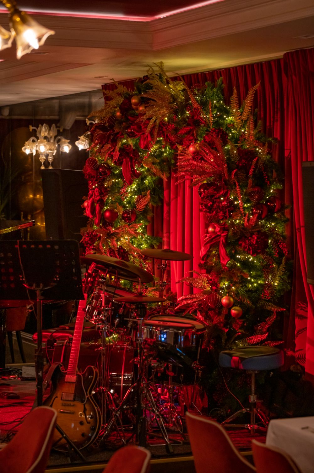 Big christmas wreath behind a stage